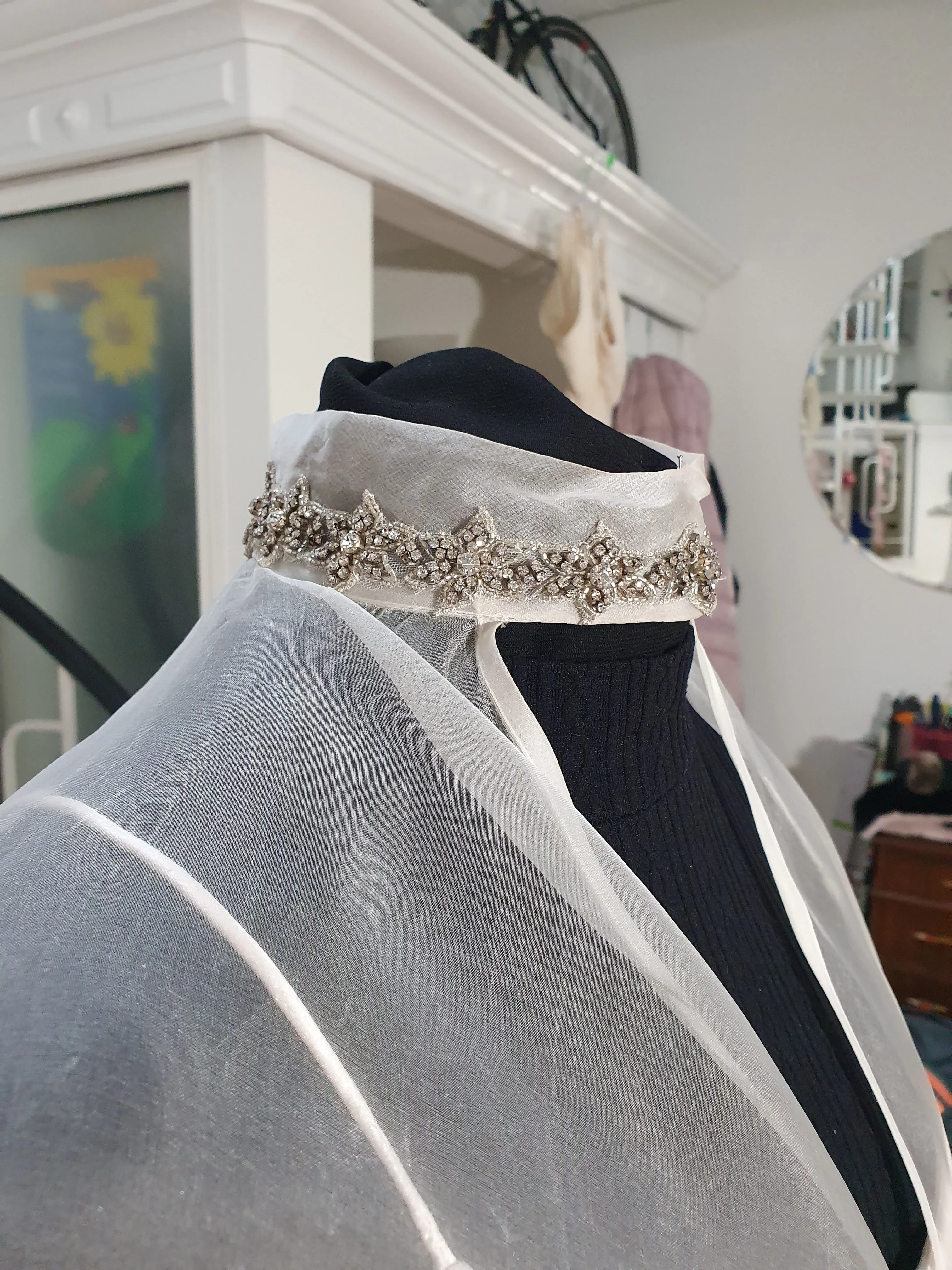 VC9: Silk organza veil cape with crystal details at neck and arm holes